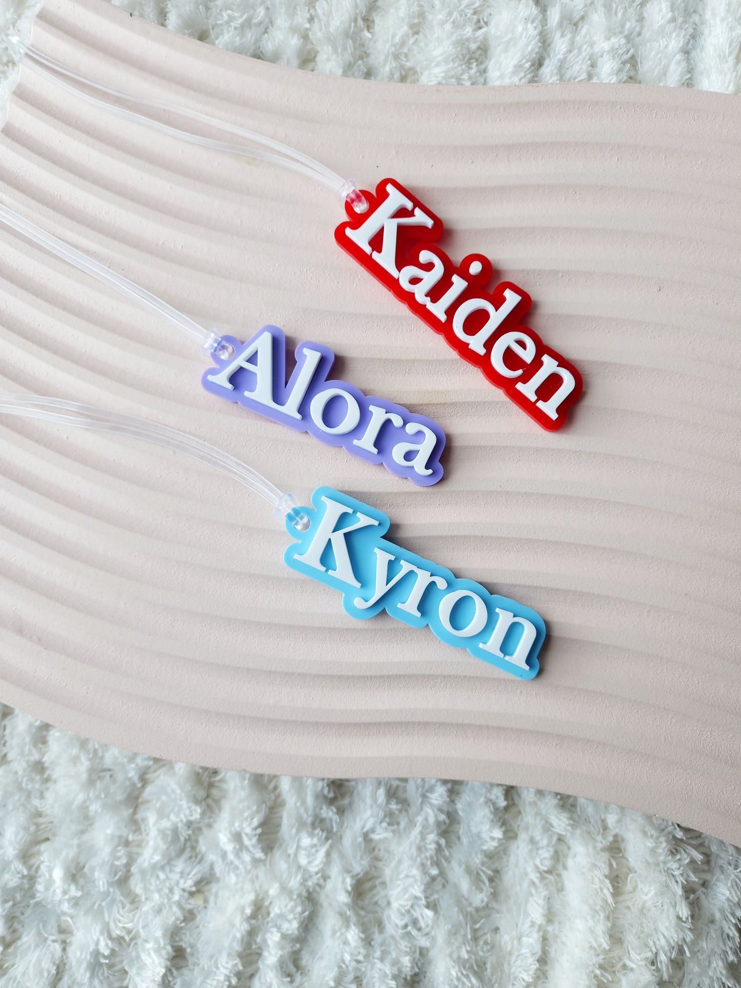 Double layered acrylic bag tag